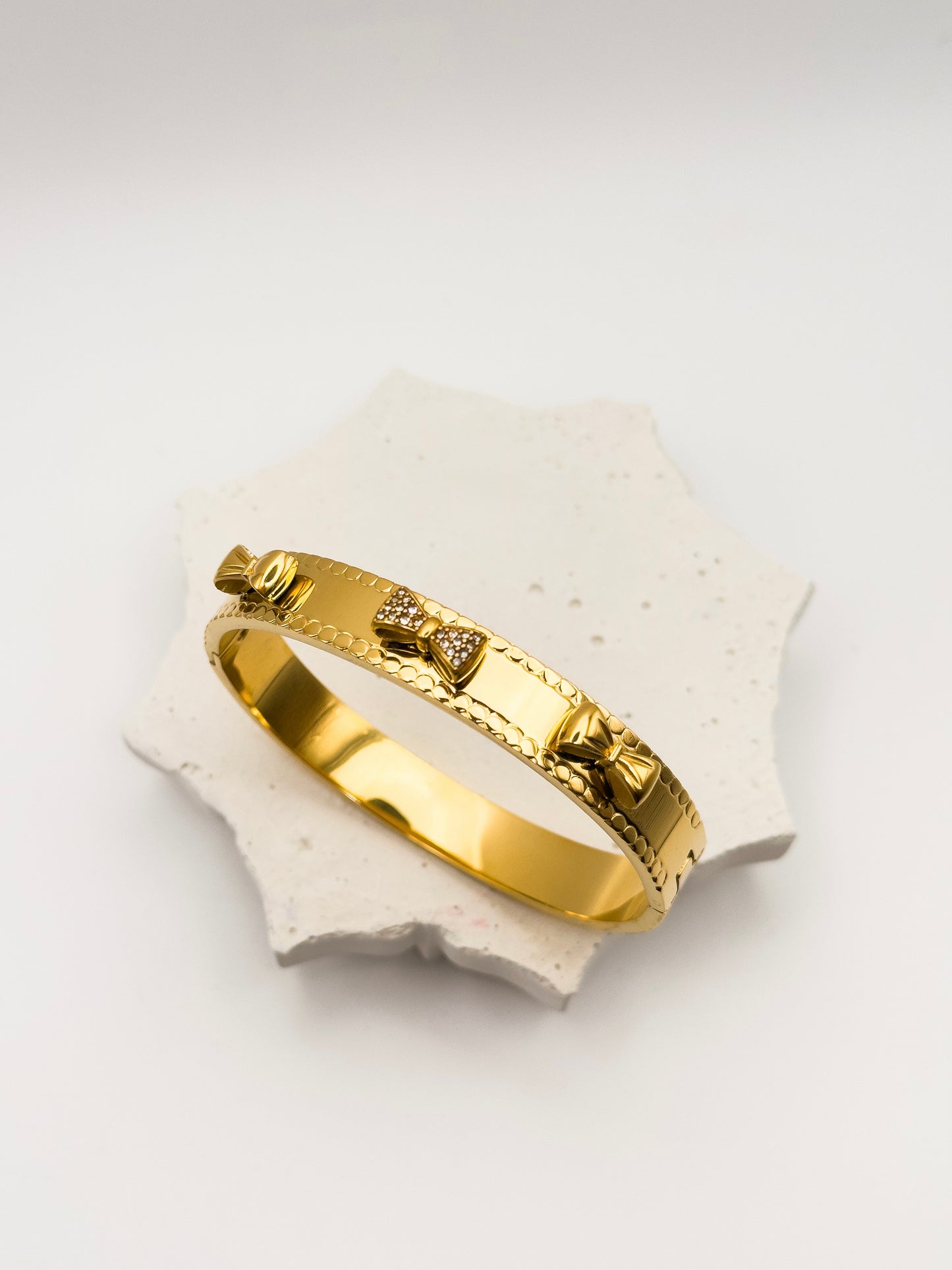 Avara Bow Gold Bangle